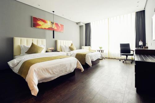 Imagen de la habitación del Jinjiang Metropolo Hotels (Shanghai Hongqiao Airport Wuzhong Road Branch). Foto 9