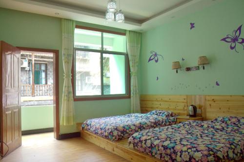 Imagen de la habitación del Jinsanjiao Guesthouse. Foto 6
