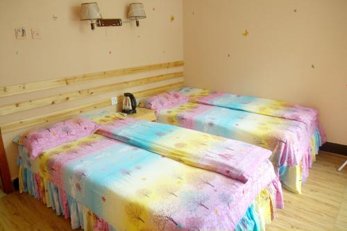 Imagen de la habitación del Jinsanjiao Guesthouse. Foto 9