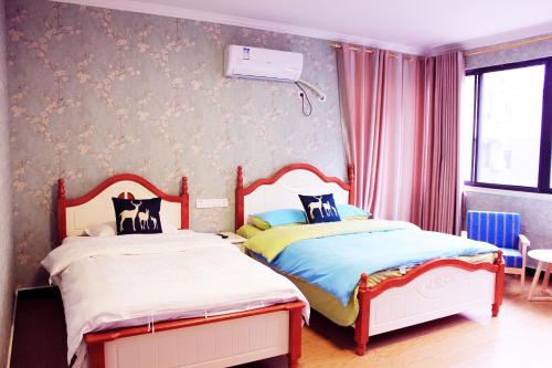 Imagen de la habitación del Jinyue Guesthouse. Foto 6