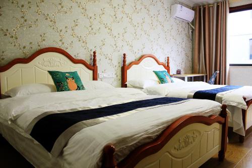 Imagen de la habitación del Jinyue Guesthouse. Foto 8