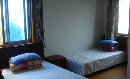 Imagen de la habitación del Jiu Hao Art Hotel. Foto 1