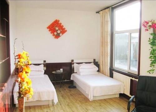 Imagen de la habitación del Jiu Hao Art Hotel. Foto 4