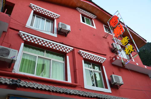 Imagen de la habitación del Jiuzhaigou Xiangxie Inn. Foto 2