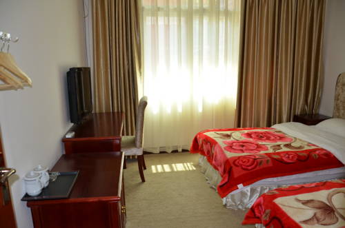 Imagen de la habitación del Jiuzhaigou Xiangxie Inn. Foto 5