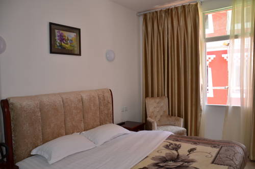 Imagen de la habitación del Jiuzhaigou Xiangxie Inn. Foto 6