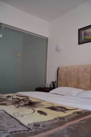 Imagen de la habitación del Jiuzhaigou Xiangxie Inn. Foto 9