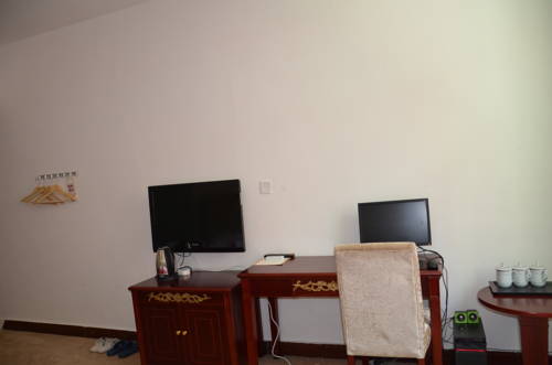 Imagen de la habitación del Jiuzhaigou Xiangxie Inn. Foto 12