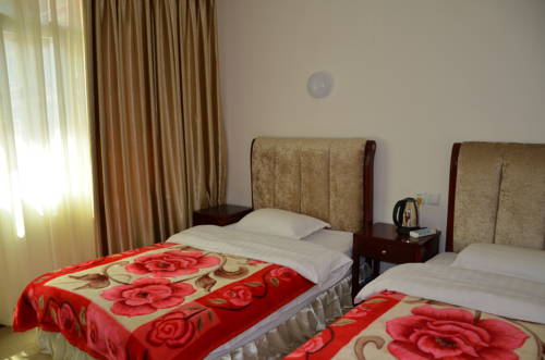 Imagen de la habitación del Jiuzhaigou Xiangxie Inn. Foto 15