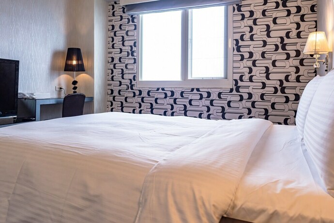 Imagen de la habitación del Joy Hotel Sanchung. Foto 12