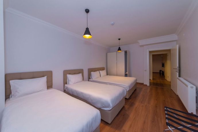 Imagen de la habitación del Joy Suites. Foto 5