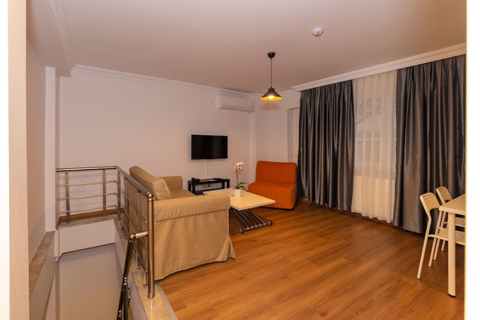 Imagen de la habitación del Joy Suites. Foto 7