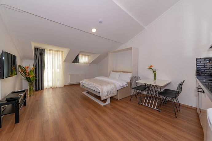 Imagen de la habitación del Joy Suites. Foto 8