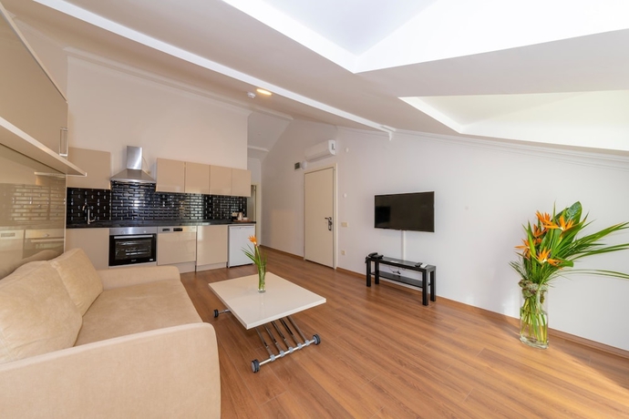 Imagen de la habitación del Joy Suites. Foto 9
