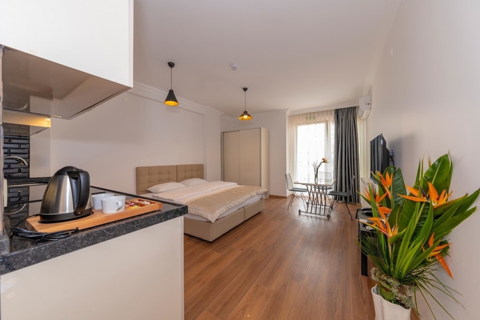 Imagen de la habitación del Joy Suites. Foto 11