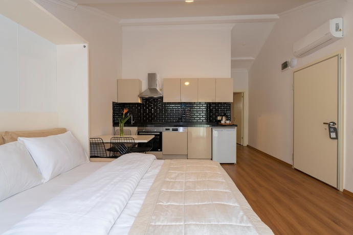 Imagen de la habitación del Joy Suites. Foto 12