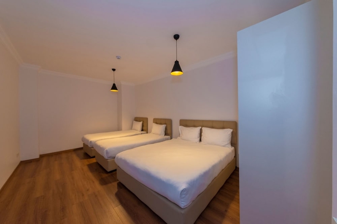 Imagen de la habitación del Joy Suites. Foto 14