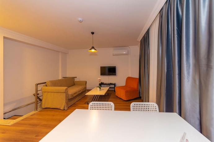 Imagen de la habitación del Joy Suites. Foto 16