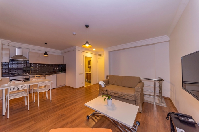 Imagen de la habitación del Joy Suites. Foto 17