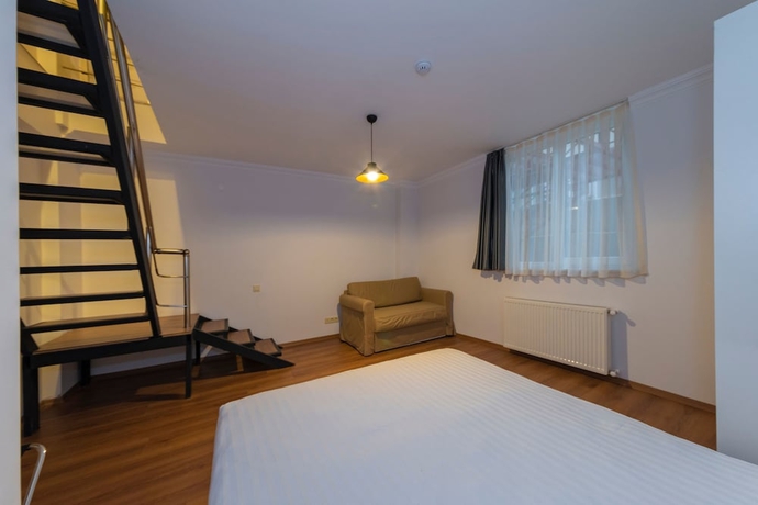 Imagen de la habitación del Joy Suites. Foto 18