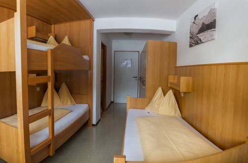 Imagen de la habitación del Jugendgästehaus Alpincenter. Foto 8