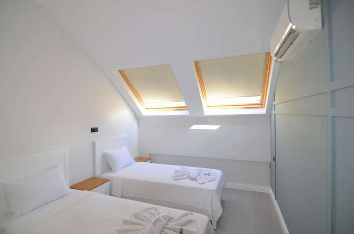 Imagen de la habitación del Juglans Suites. Foto 17