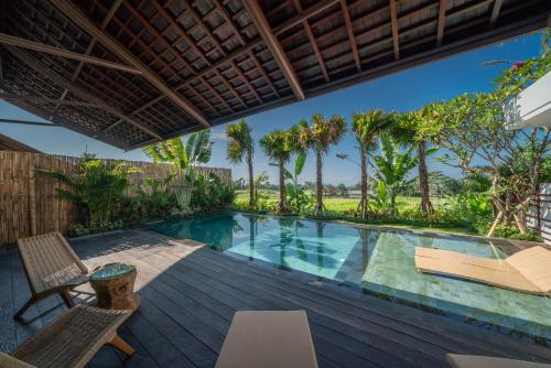 Imagen de la habitación del K Club Ubud. Foto 6
