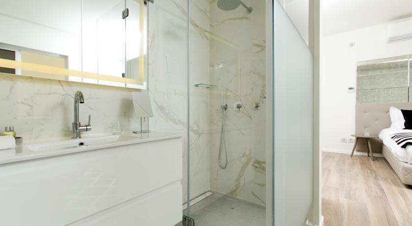 Imagen de los interiores del K Suites TLV By The Beach. Foto 6