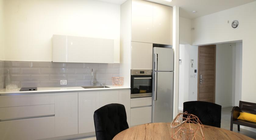 Imagen de los interiores del K Suites TLV By The Beach. Foto 8