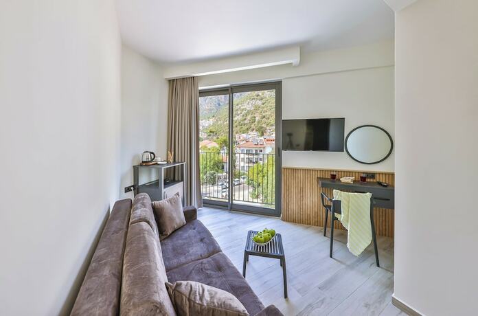 Imagen de la habitación del KAŞ ATHENA HOTEL. Foto 11