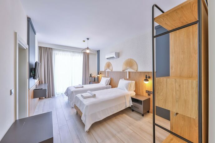 Imagen de la habitación del KAŞ ATHENA HOTEL. Foto 13
