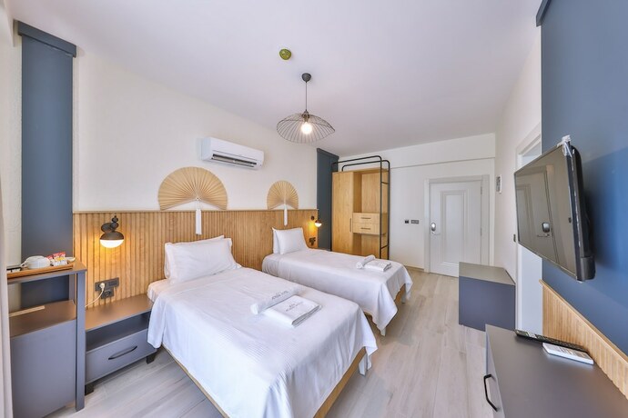 Imagen de la habitación del KAŞ ATHENA HOTEL. Foto 15
