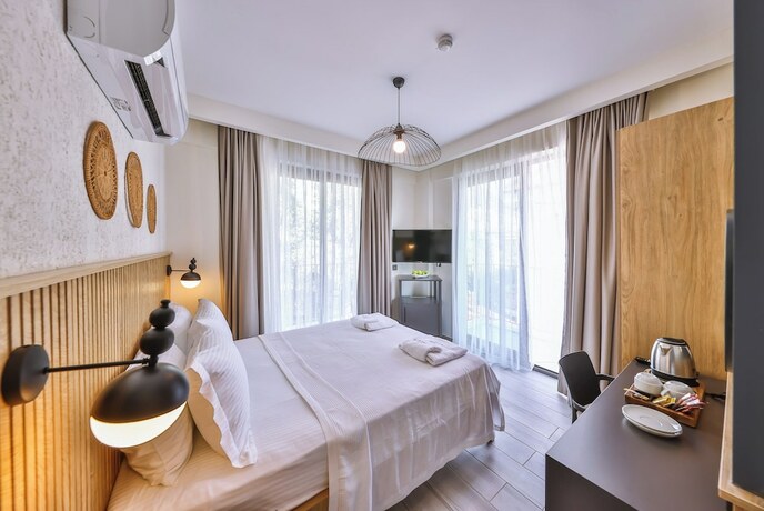Imagen de la habitación del KAŞ ATHENA HOTEL. Foto 16