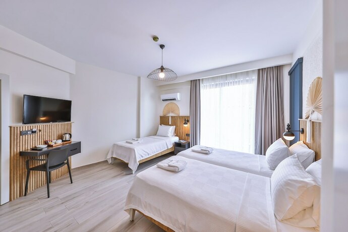 Imagen de la habitación del KAŞ ATHENA HOTEL. Foto 17