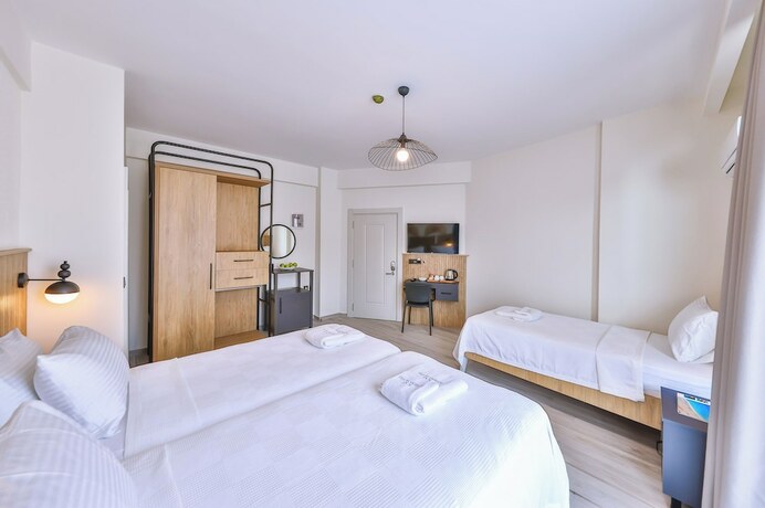 Imagen de la habitación del KAŞ ATHENA HOTEL. Foto 18