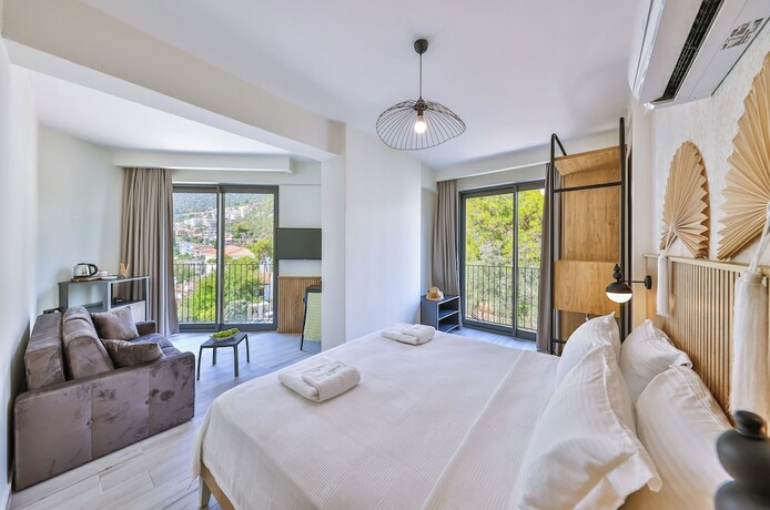 Imagen de la habitación del KAŞ ATHENA HOTEL. Foto 19