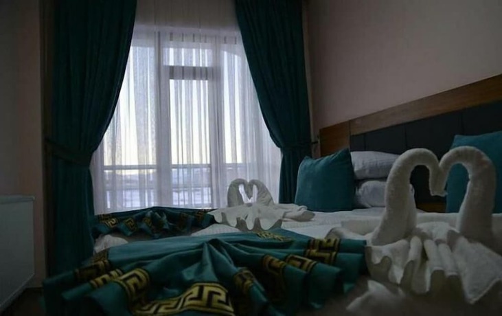 Imagen de la habitación del KADIOĞLU. Foto 4