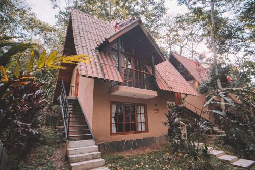Imagen de la habitación del KANTU GARDEN LODGE. Foto 17