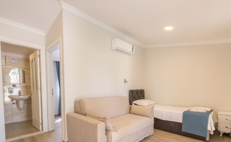 Imagen de la habitación del KIYI SUITES OTEL PALAMUTBUKU. Foto 7