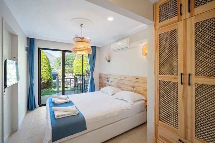Imagen de la habitación del KIYI SUITES OTEL PALAMUTBUKU. Foto 8