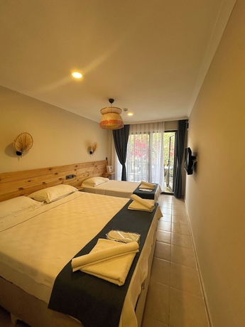 Imagen de la habitación del KIYI SUITES OTEL PALAMUTBUKU. Foto 10