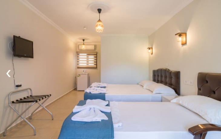 Imagen de la habitación del KIYI SUITES OTEL PALAMUTBUKU. Foto 11