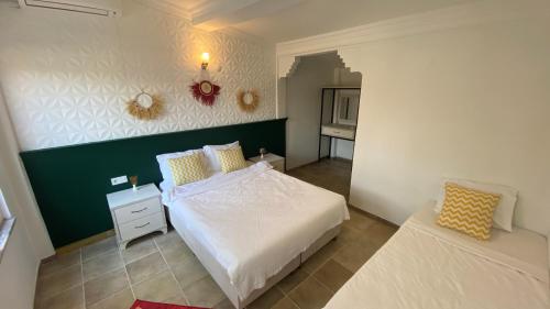 Imagen de la habitación del KİRAZ BEACH OTEL. Foto 15