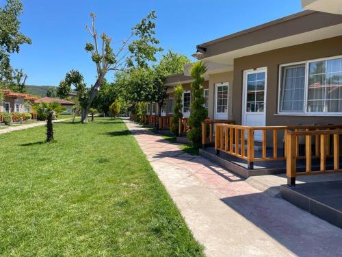 Imagen de la habitación del KİRAZ BEACH OTEL. Foto 20