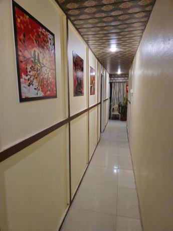 Imagen de la habitación del KSHIPRA GUEST HOUSE. Foto 11