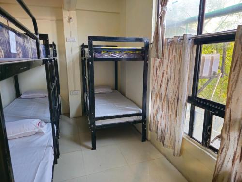 Imagen de la habitación del KSHIPRA GUEST HOUSE. Foto 12