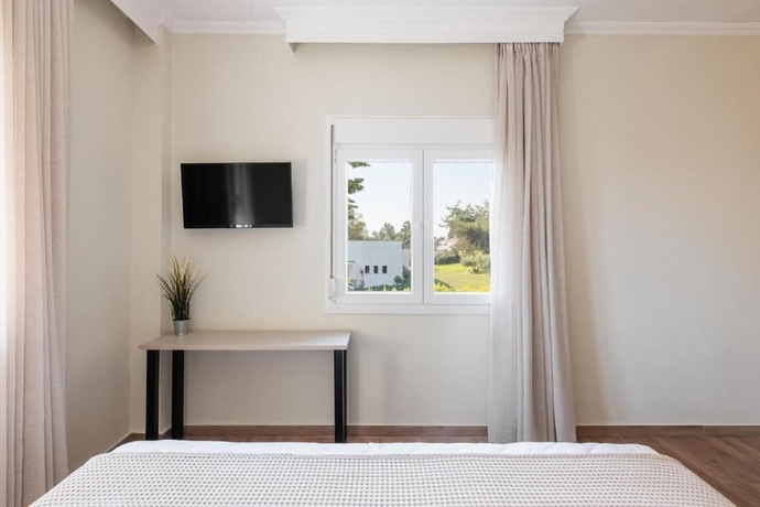Imagen de la habitación del KYMA STAY - Beachfront apartments. Foto 10