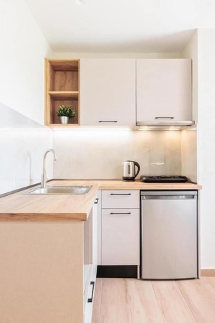 Imagen de la habitación del KYMA STAY - Beachfront apartments. Foto 16