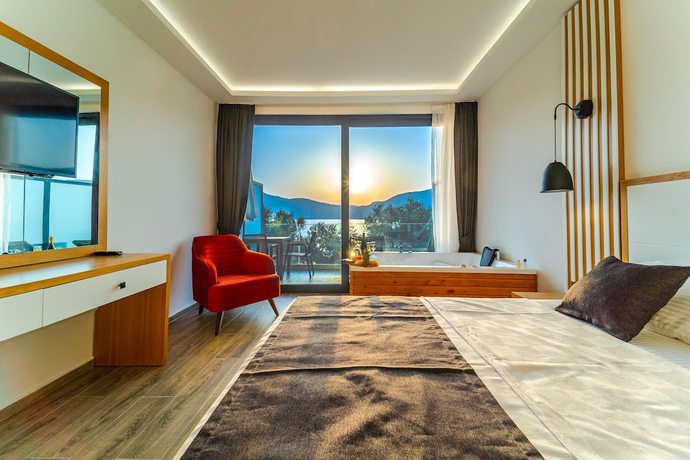 Imagen de la habitación del Kalkan Beach Park Hotel. Foto 12