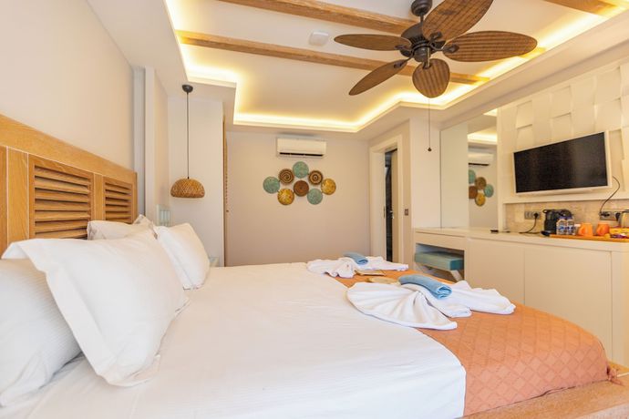 Imagen de la habitación del Kalkan Saray Suites - Adults Only. Foto 14